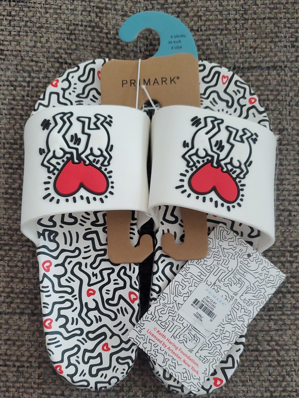 Primark x Keith Harring collab White Slide Sandals with Red Heart Graphic
